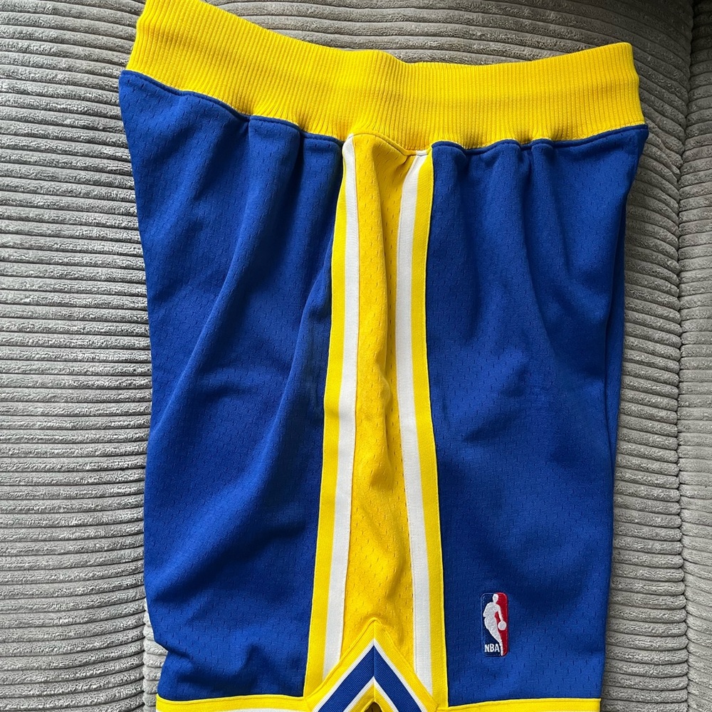 Mitchell & Ness (Golden State Warriors) Blue and Yellow Basketball Shorts.